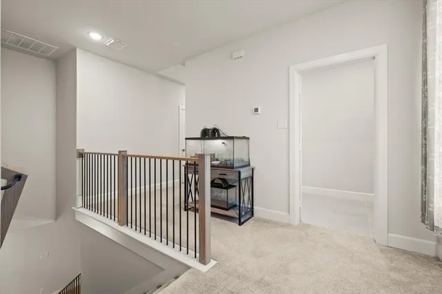 a view of a hallway with workspace