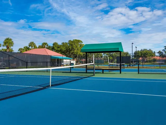 a view of lawn tennis court