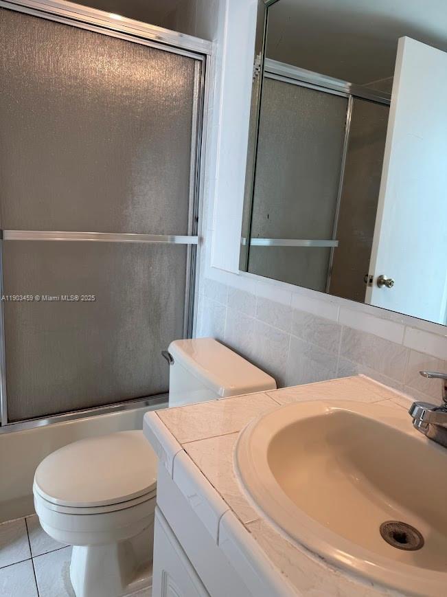 11790 Southwest 18th Street, Unit 1073 Miami, FL 33175 - Photo 16 of 25 a bathroom with a sink and a toilet