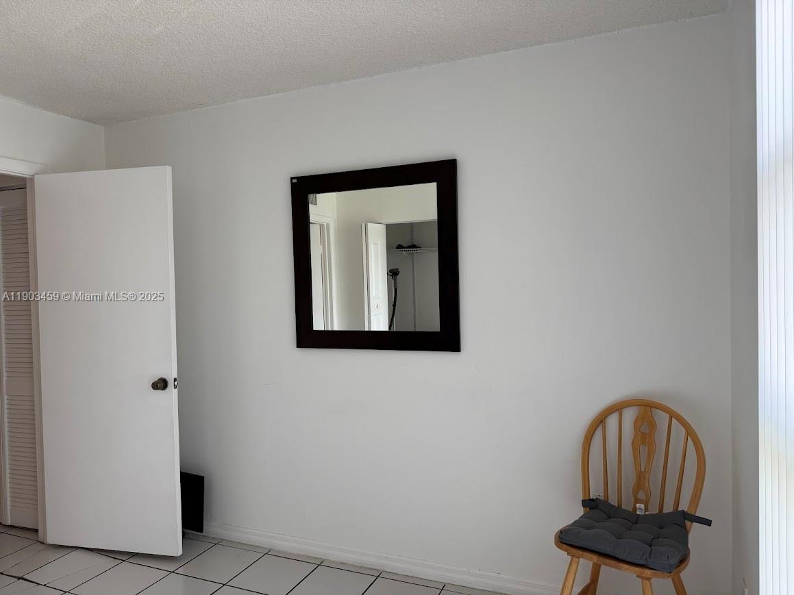 11790 Southwest 18th Street, Unit 1073 Miami, FL 33175 - Photo 17 of 25 a front view of a house with entryway