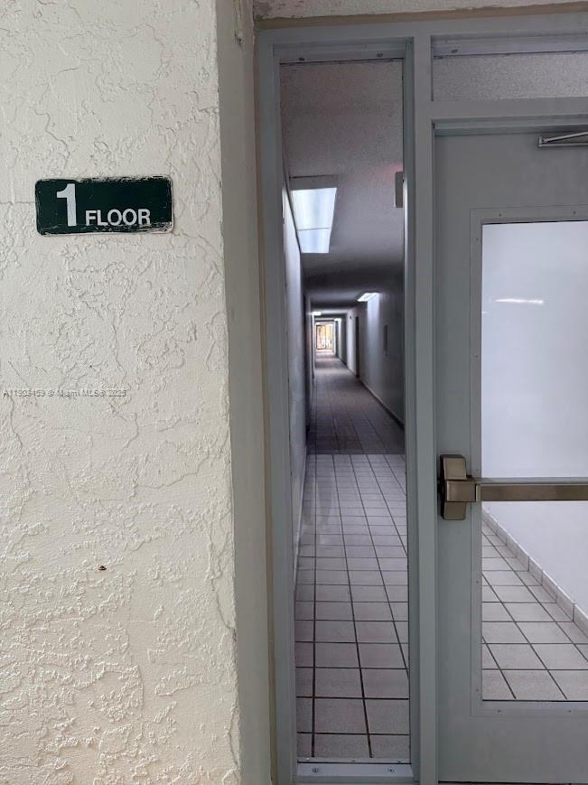 11790 Southwest 18th Street, Unit 1073 Miami, FL 33175 - Photo 3 of 25 a view of a hallway