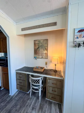 a room with a table and chairs