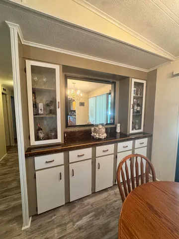 a view of a kitchen from the hallway