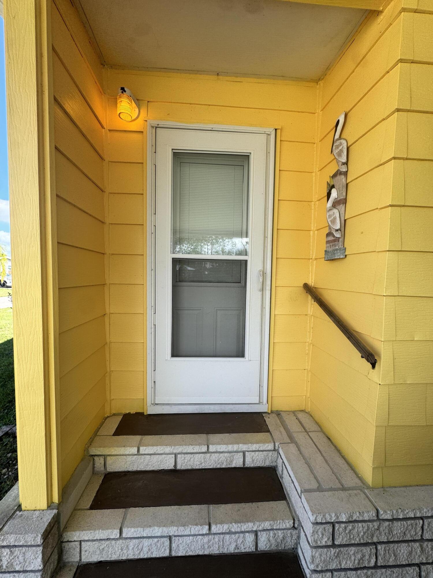 9 San Felipe Fort Pierce, FL 34951 - Photo 3 of 36 a view of a door of the house