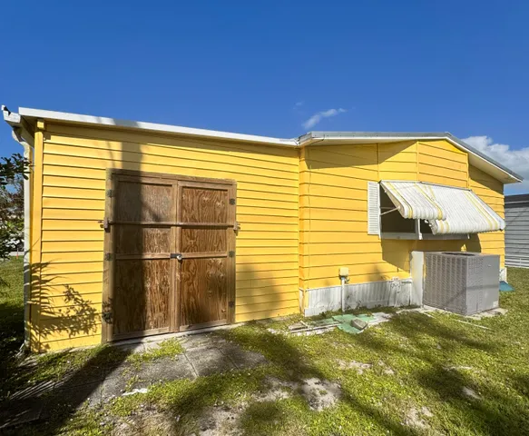 a view of a back yard of the house