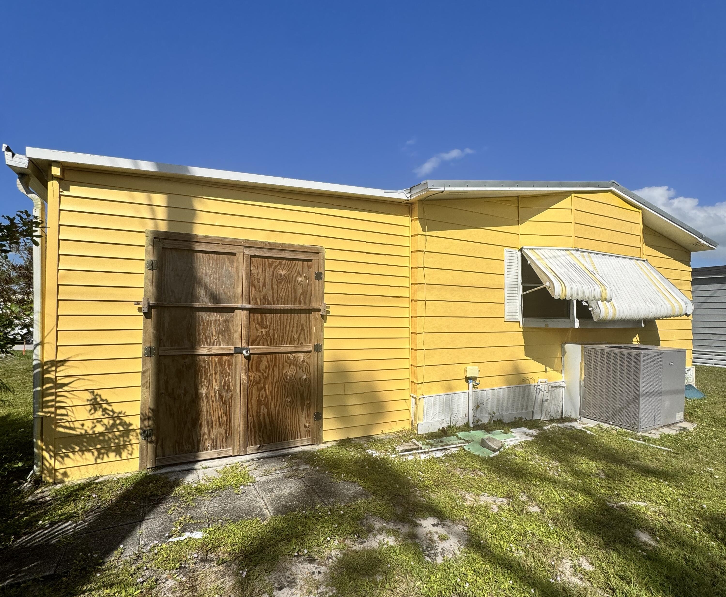 9 San Felipe Fort Pierce, FL 34951 - Photo 5 of 36 a view of a back yard of the house