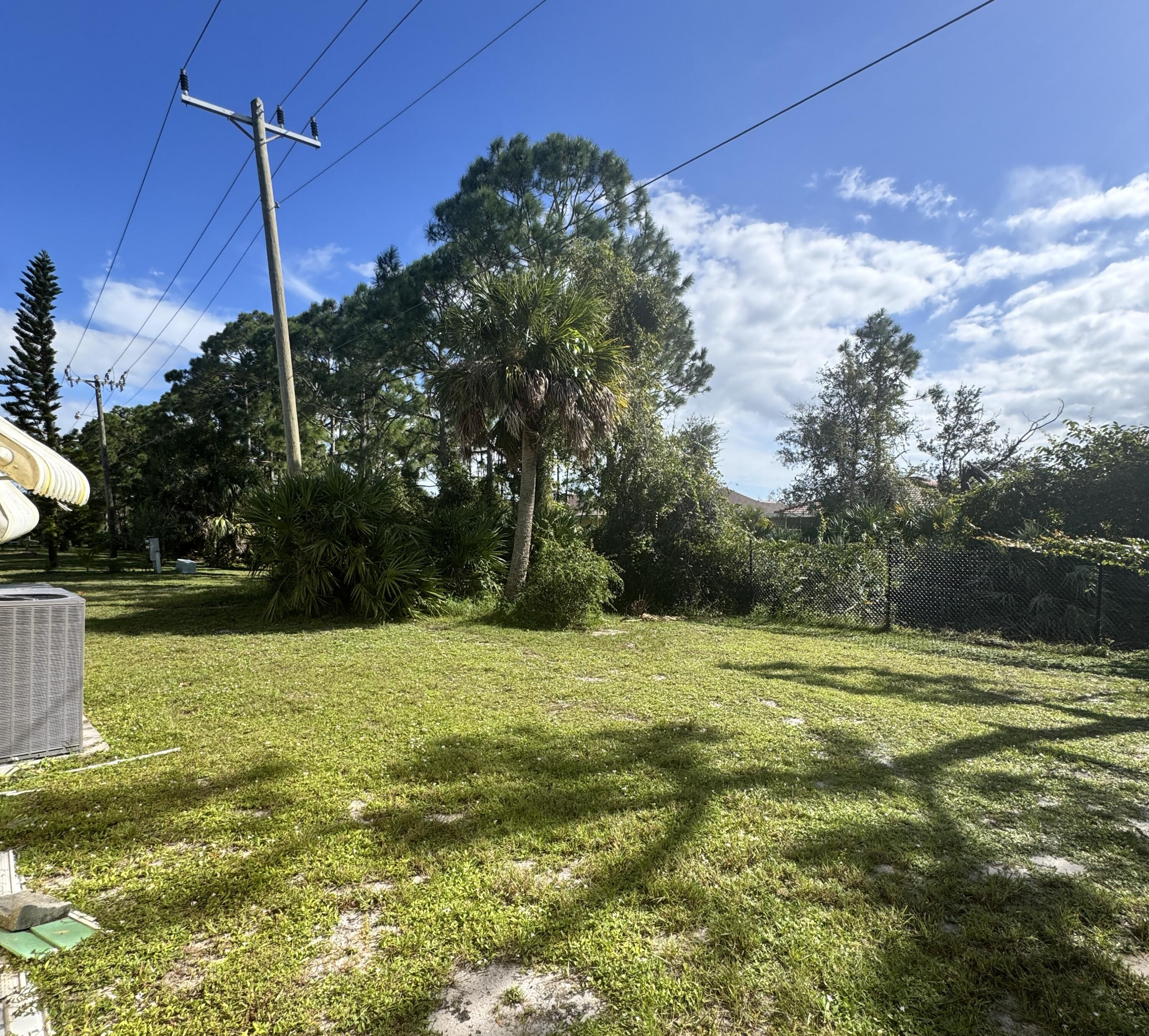 9 San Felipe Fort Pierce, FL 34951 - Photo 7 of 36 a view of a field with a tree