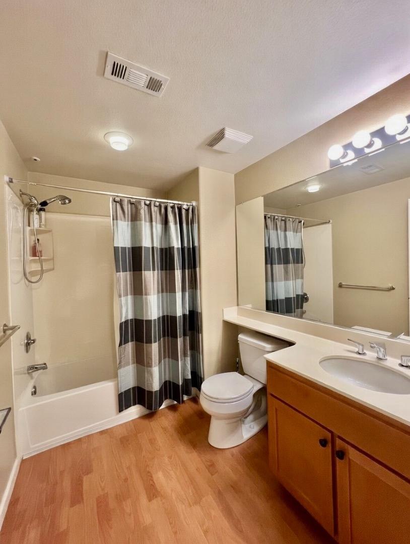 1310 Saddle Rack Street, Unit 347 San Jose, CA 95126 - Photo 23 of 42 a bathroom with a sink toilet a shower and a bathtub