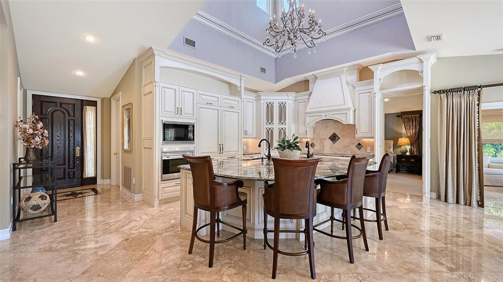 725 Penfield Street Longboat Key, FL 34228 - Photo 4 of 33 a view of a dining room with furniture