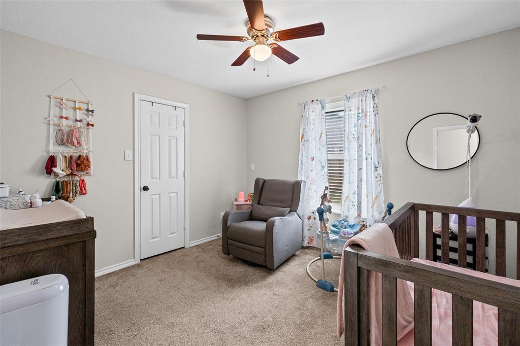 323 Sage Trail Springtown, TX 76082 - Photo 25 of 32 a bedroom with furniture and a window