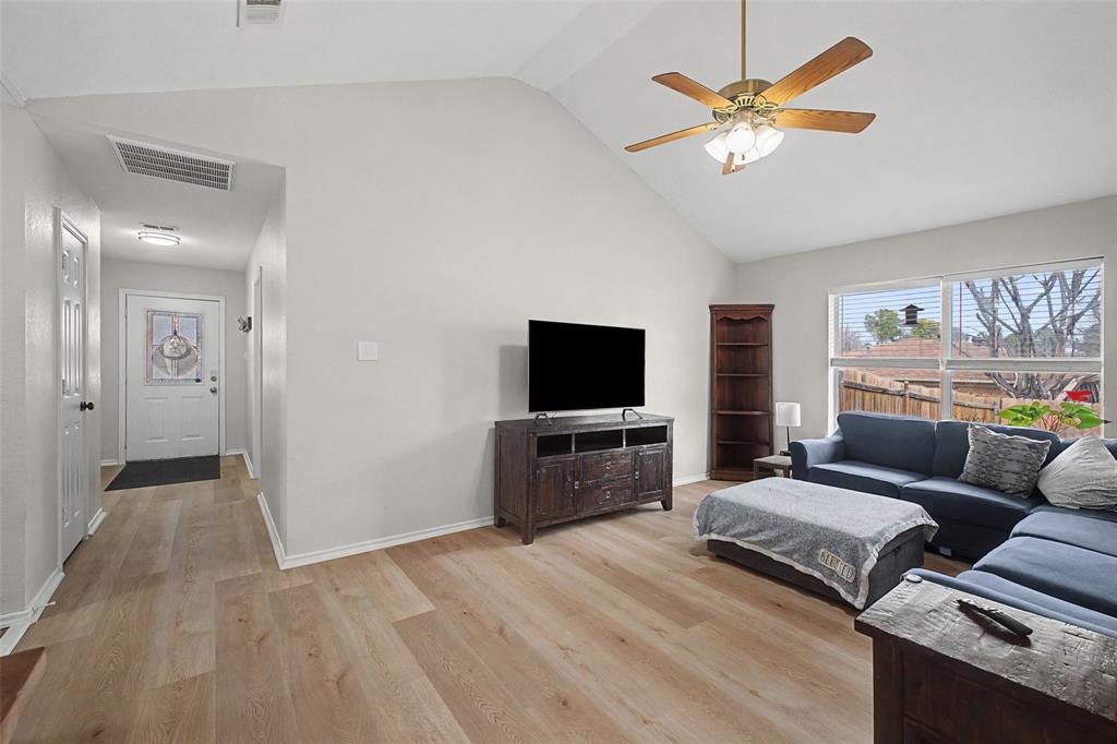 323 Sage Trail Springtown, TX 76082 - Photo 7 of 32 a living room with furniture and a flat screen tv