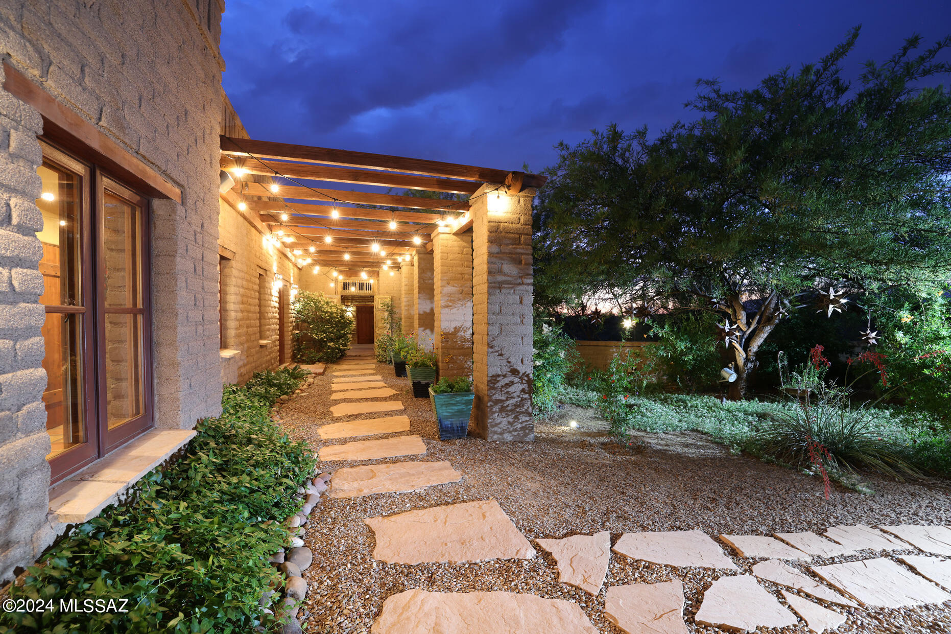 11725 East Spanish Ridge Place Tucson, AZ 85730 - Photo 43 of 51 a view of a pathway of a house with a yard