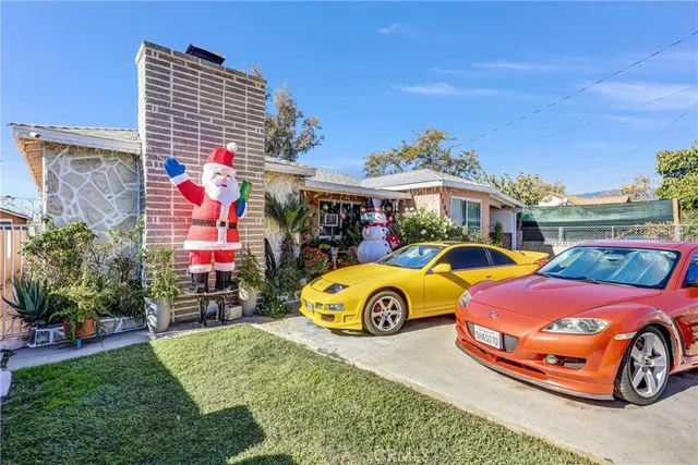 a front view of a building with garden
