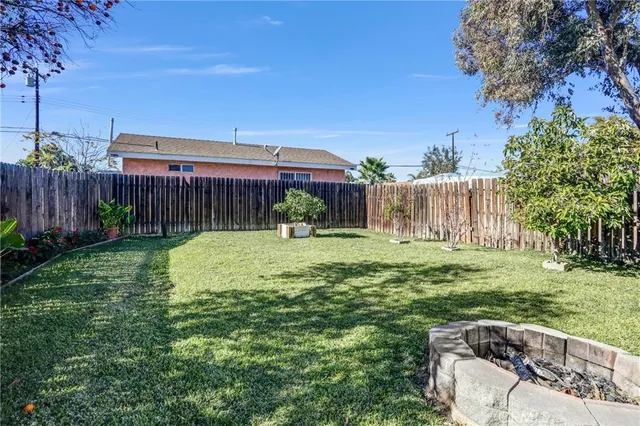 a view of a backyard with a garden and plants