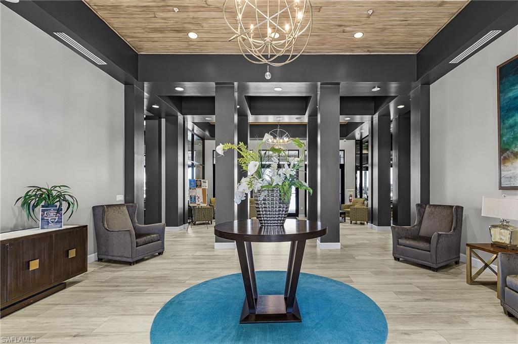 1434 Redona Way Naples, FL 34113 - Photo 37 of 47 a living room with furniture