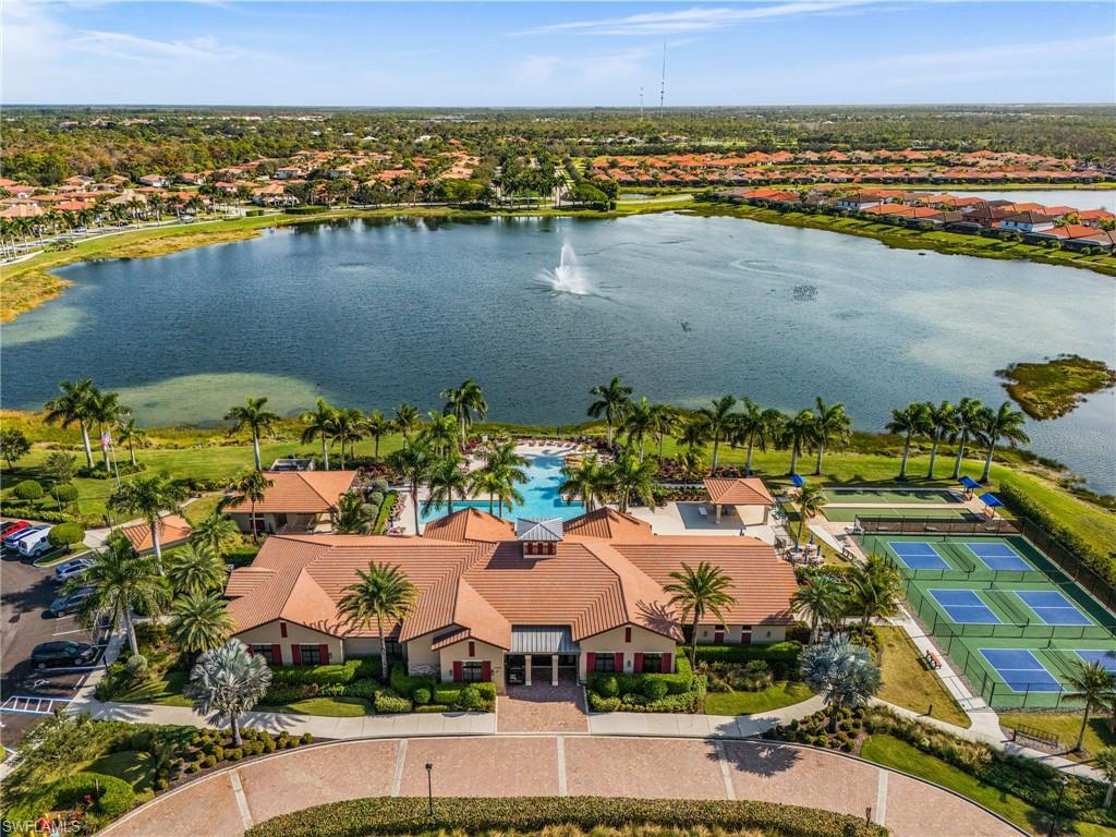 1434 Redona Way Naples, FL 34113 - Photo 47 of 47 an aerial view of residential houses with outdoor space and river