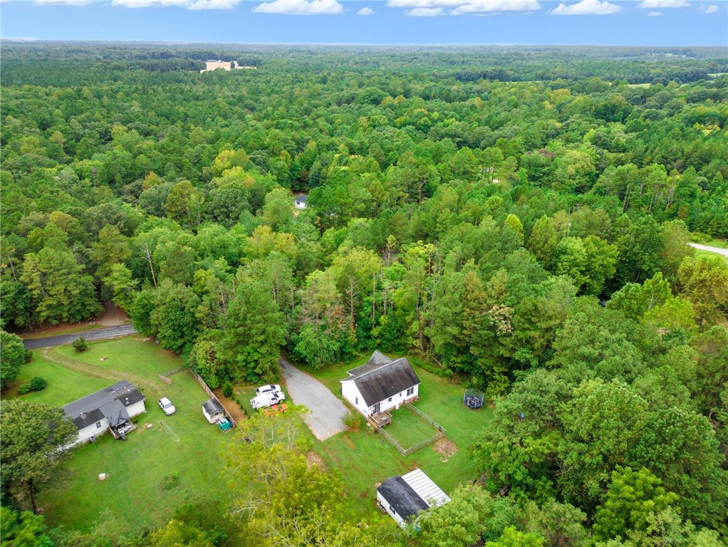 878 Salvia Road Newtown, VA 23126 - Photo 29 of 33 Aerial overview of property's location featuring a forest