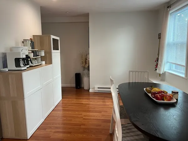 a kitchen with stainless steel appliances granite countertop a refrigerator sink and stove