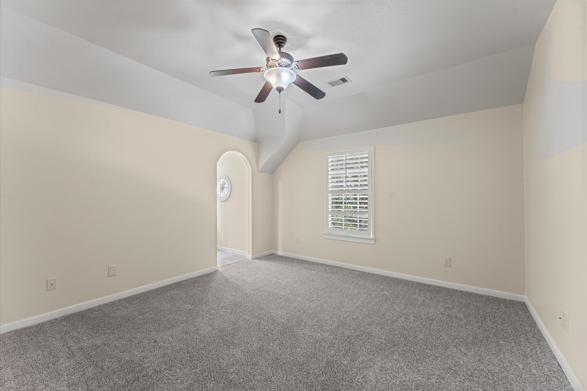 7 North Beech Springs Circle Spring, TX 77389 - Photo 37 of 50 a view of a livingroom with a ceiling fan and window
