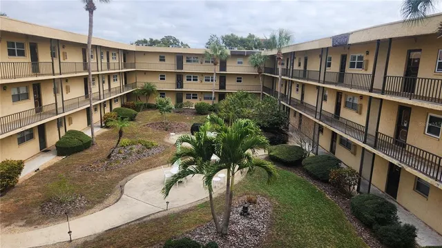 a view of houses with roof deck and living room