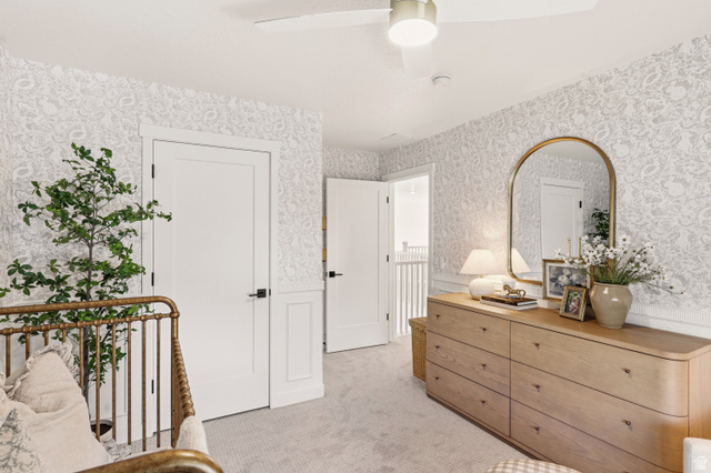 870 North Ada Loop Lehi, UT 84048 - Photo 29 of 51 Textured wallpaper with a subtle pattern accentuates the room, complemented by white trim and wainscoting