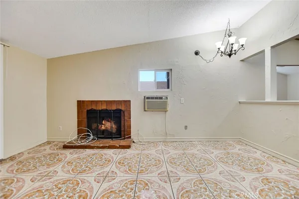 a view of a livingroom with a fireplace