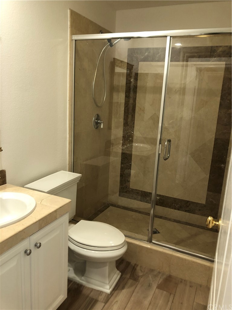 24 Tesoro Newport Coast, CA 92657 - Photo 11 of 20 a bathroom with a toilet and a shower