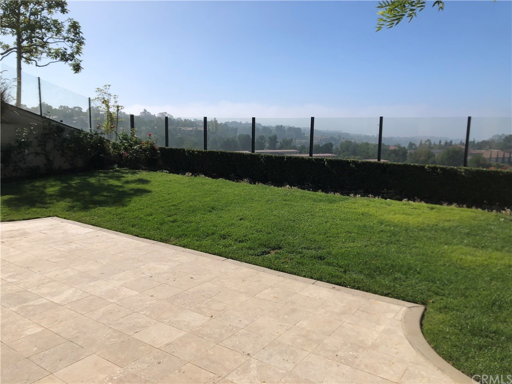 24 Tesoro Newport Coast, CA 92657 - Photo 20 of 20 a view of a garden with a lake