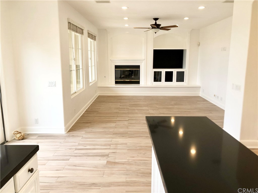 24 Tesoro Newport Coast, CA 92657 - Photo 7 of 20 a view of a living room with furniture and a fireplace