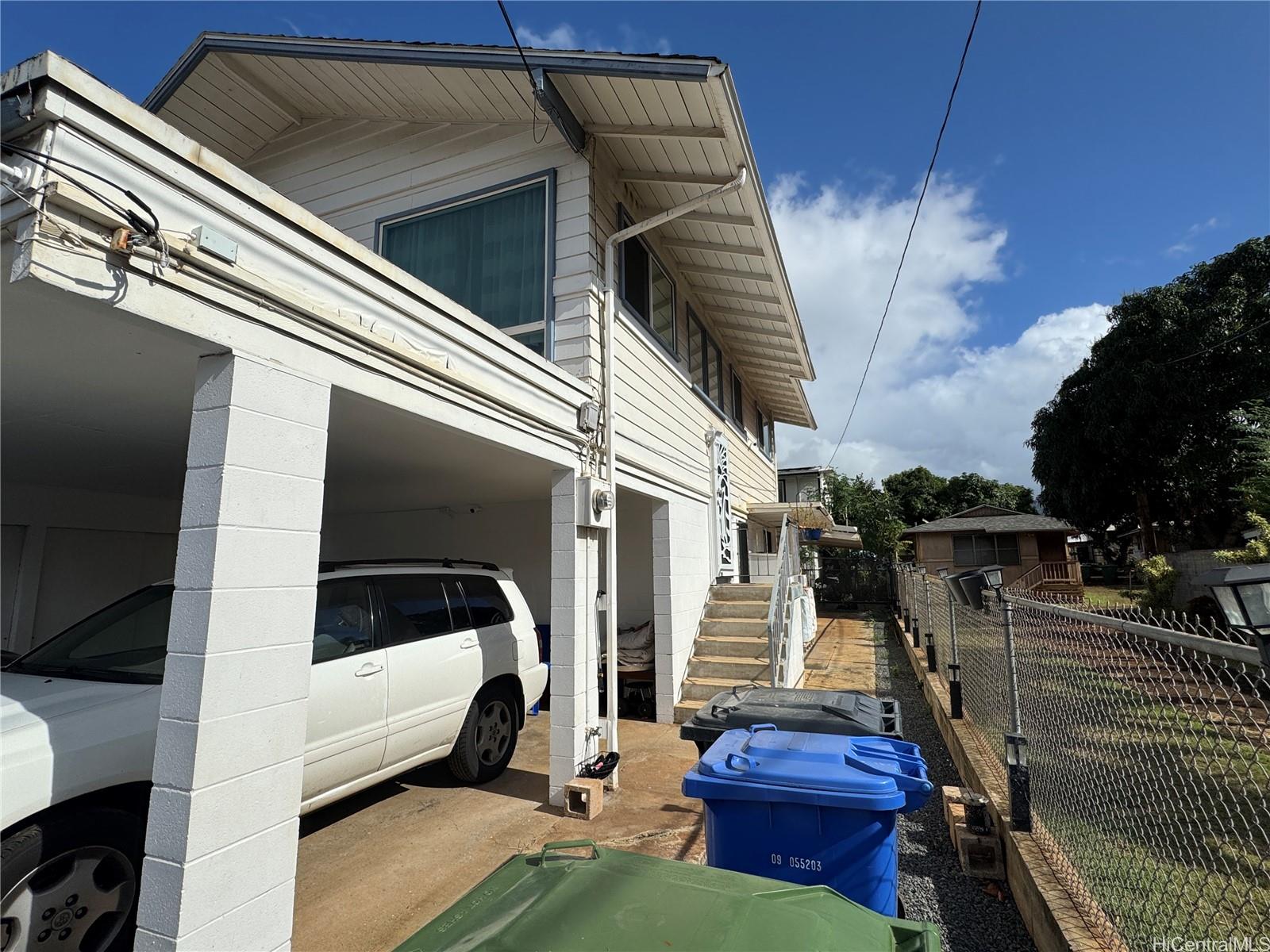 2326 Rose Street Honolulu, HI 96819 - Photo 2 of 19 a view of a balcony with chairs
