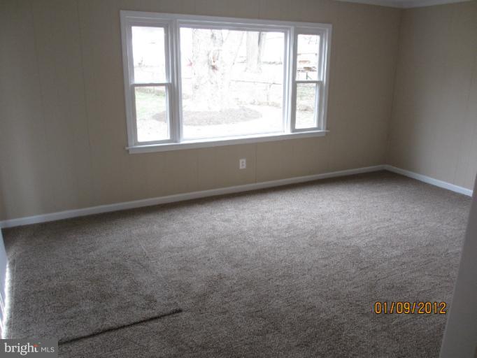 2801 Sheraton Street Silver Spring, MD 20906 - Photo 1 of 15 an empty room with a window