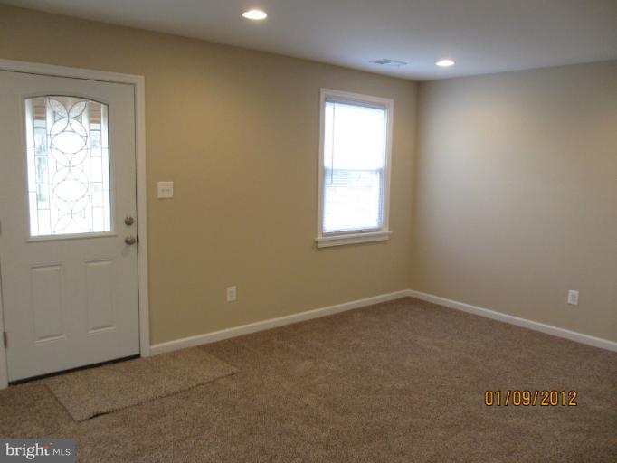 2801 Sheraton Street Silver Spring, MD 20906 - Photo 11 of 15 an empty room with windows