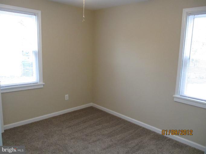 2801 Sheraton Street Silver Spring, MD 20906 - Photo 13 of 15 an empty room with a window