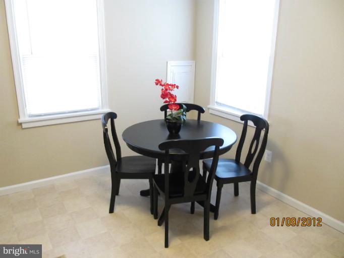 2801 Sheraton Street Silver Spring, MD 20906 - Photo 6 of 15 a dining room with furniture and window