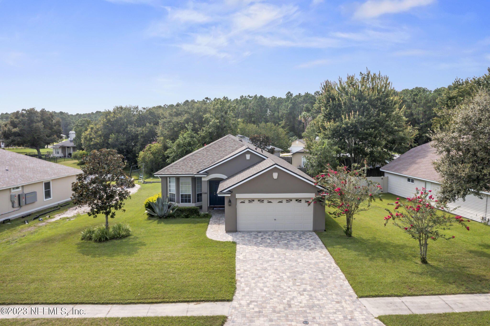133 Whisper Ridge Drive St. Augustine, FL 32092 - Photo 2 of 3 a front view of house with yard