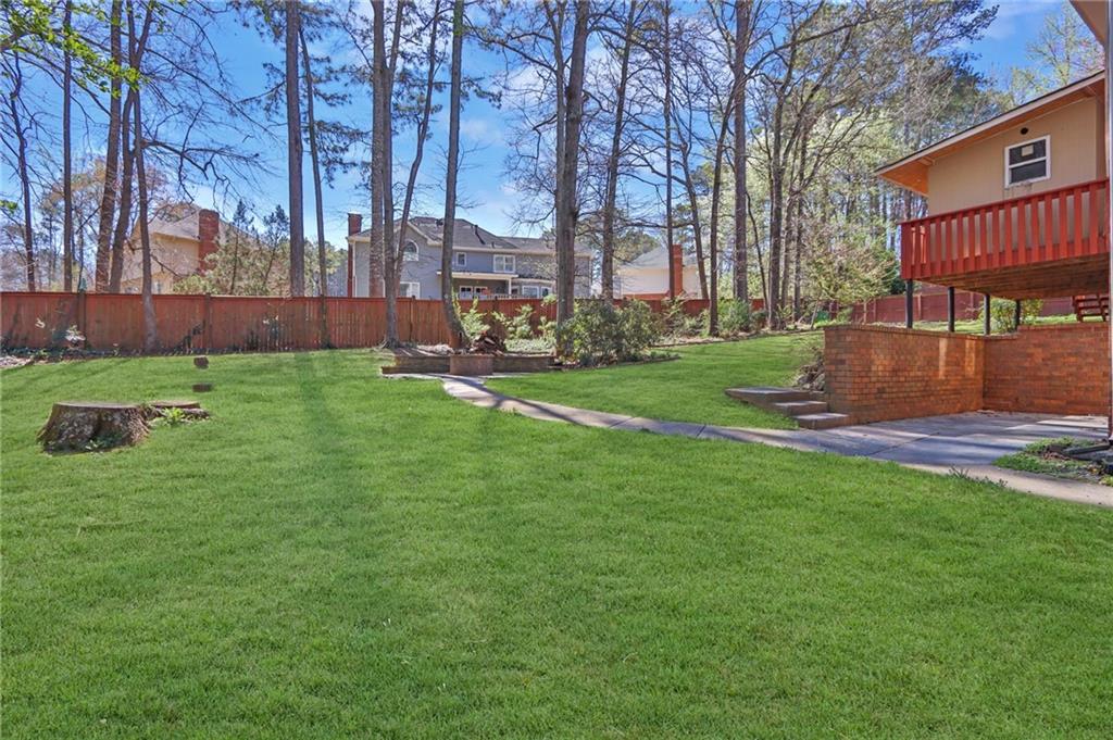 5010 Oak Tree Lane Stone Mountain, GA 30087 - Photo 32 of 35 a view of a garden
