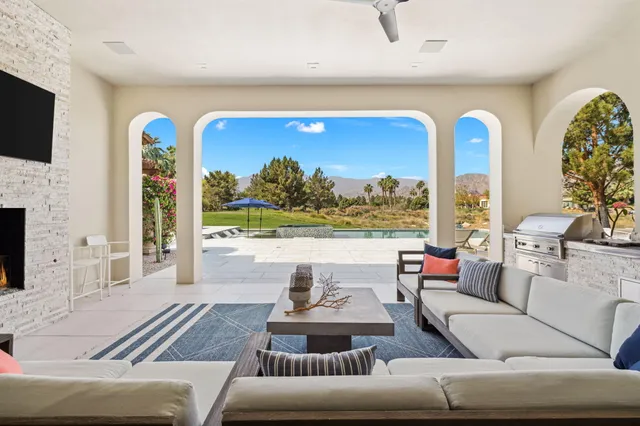 a view of a house with swimming pool