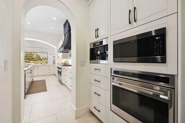 an aerial view of a house with outdoor space