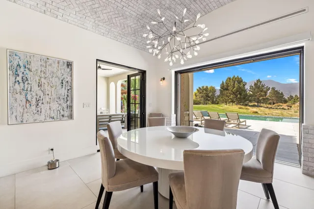 a view of a city with mountains in the background