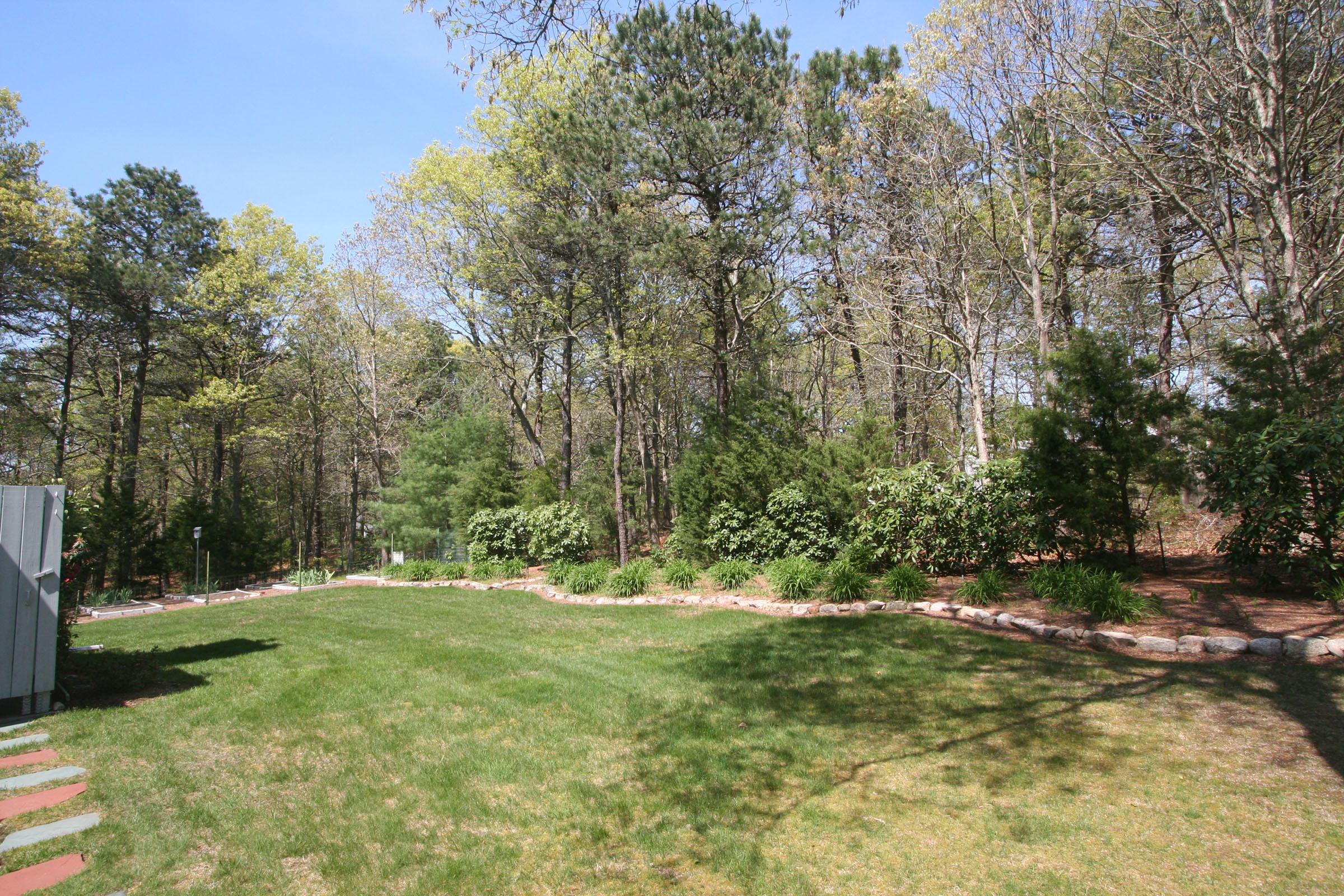 1387 Old Post Road Marstons Mills, MA 02648 - Photo 6 of 22 a view of outdoor space with trees all around