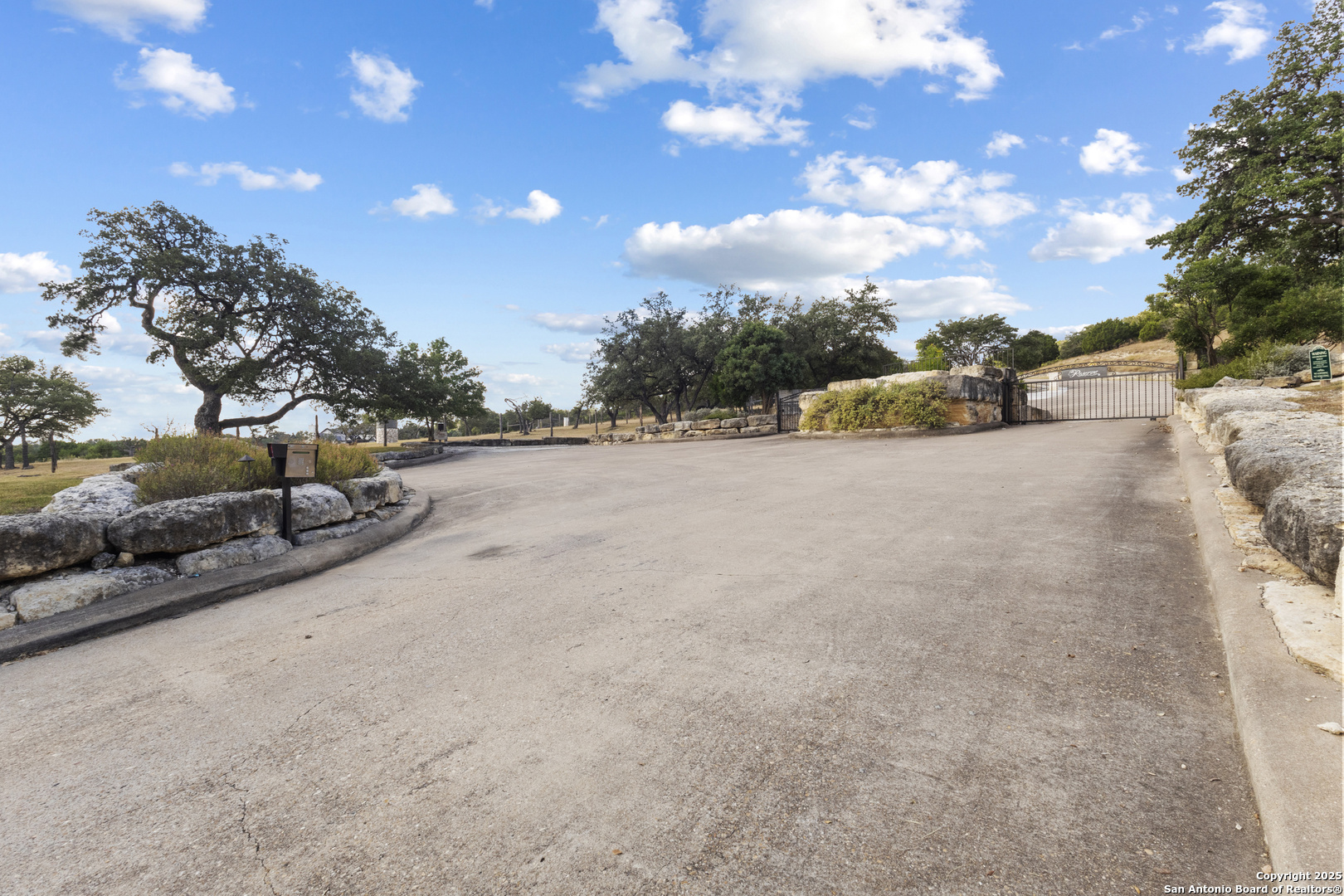 146 Painted Sky Comfort, TX 78013 - Photo 14 of 15 a view of a road with a building in the background