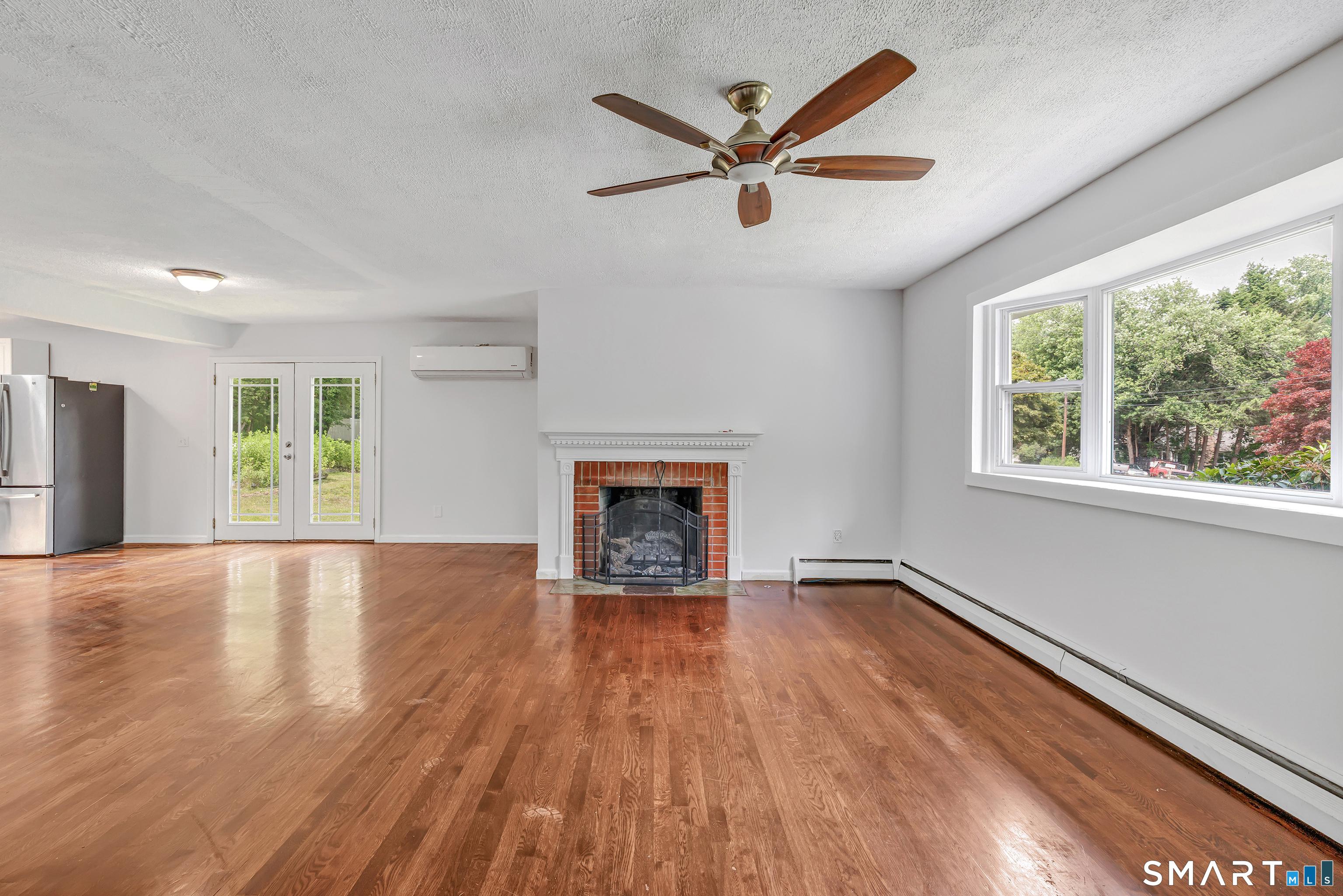 17 Woodlawn Road Monroe, CT 06468 - Photo 11 of 37 Formal living room w fireplace adds warmth and comfort