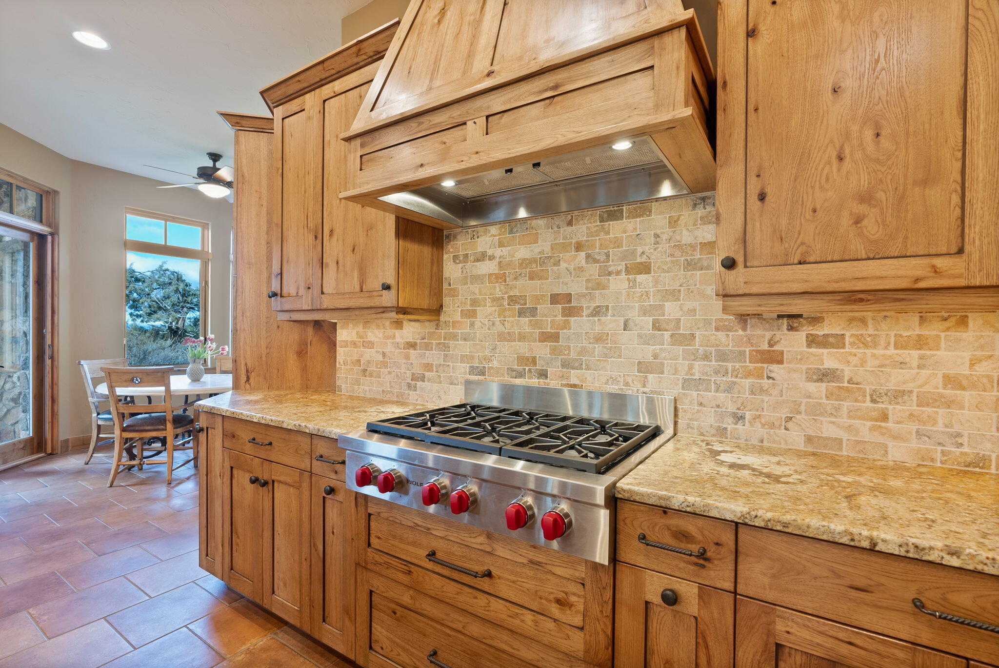 22887 Ghost Tree Lane Bend, OR 97701 - Photo 15 of 97 Wolf gas cooktop with custom hood