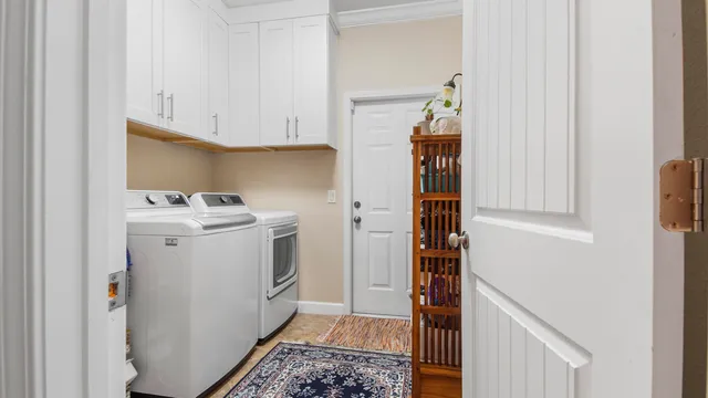 a utility room with dryer and washer