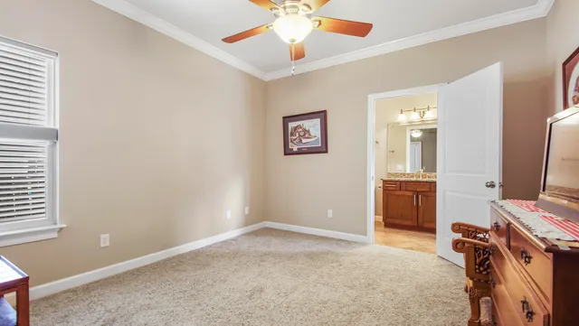 a view of a livingroom with a workspace