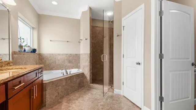 a bathroom with a bathtub and a sink