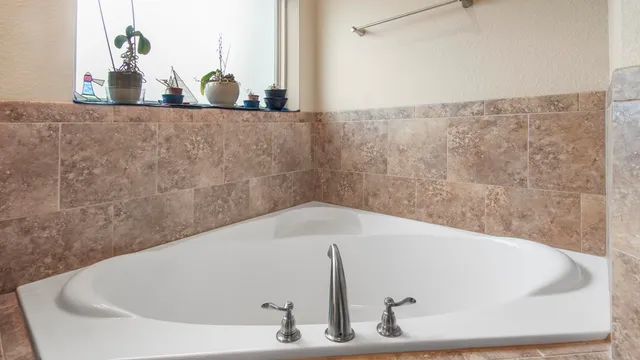 a bath tub sitting in a bathroom