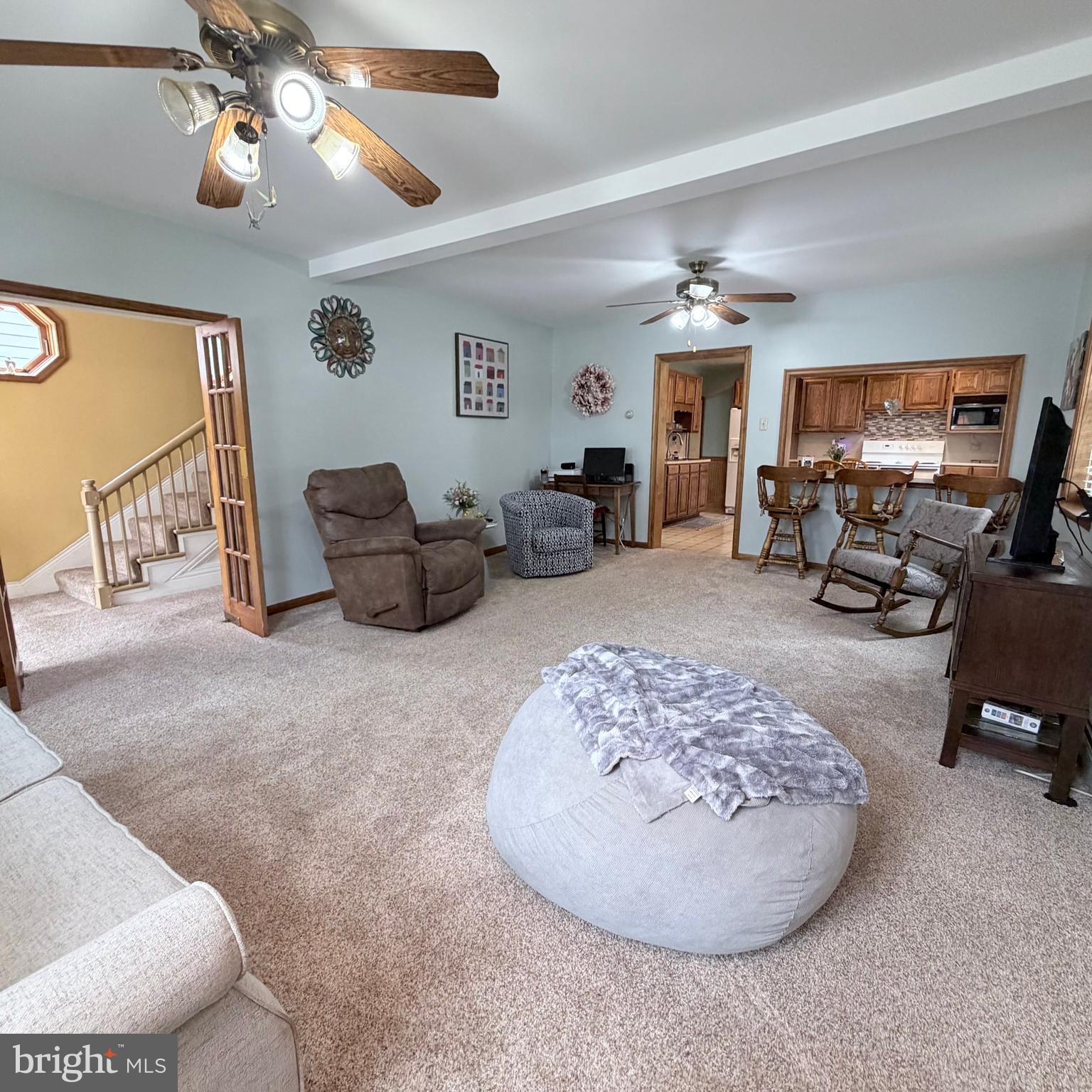 12997 Main Street Fort Loudon, PA 17224 - Photo 8 of 48 a living room with furniture and a flat screen tv