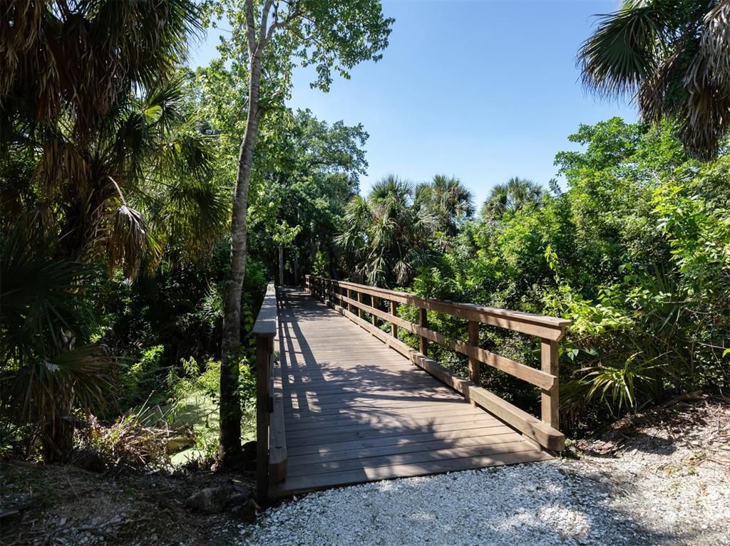 764 Sawgrass Bridge Road Venice, FL 34292 - Photo 42 of 60 a view of outdoor space deck and tree