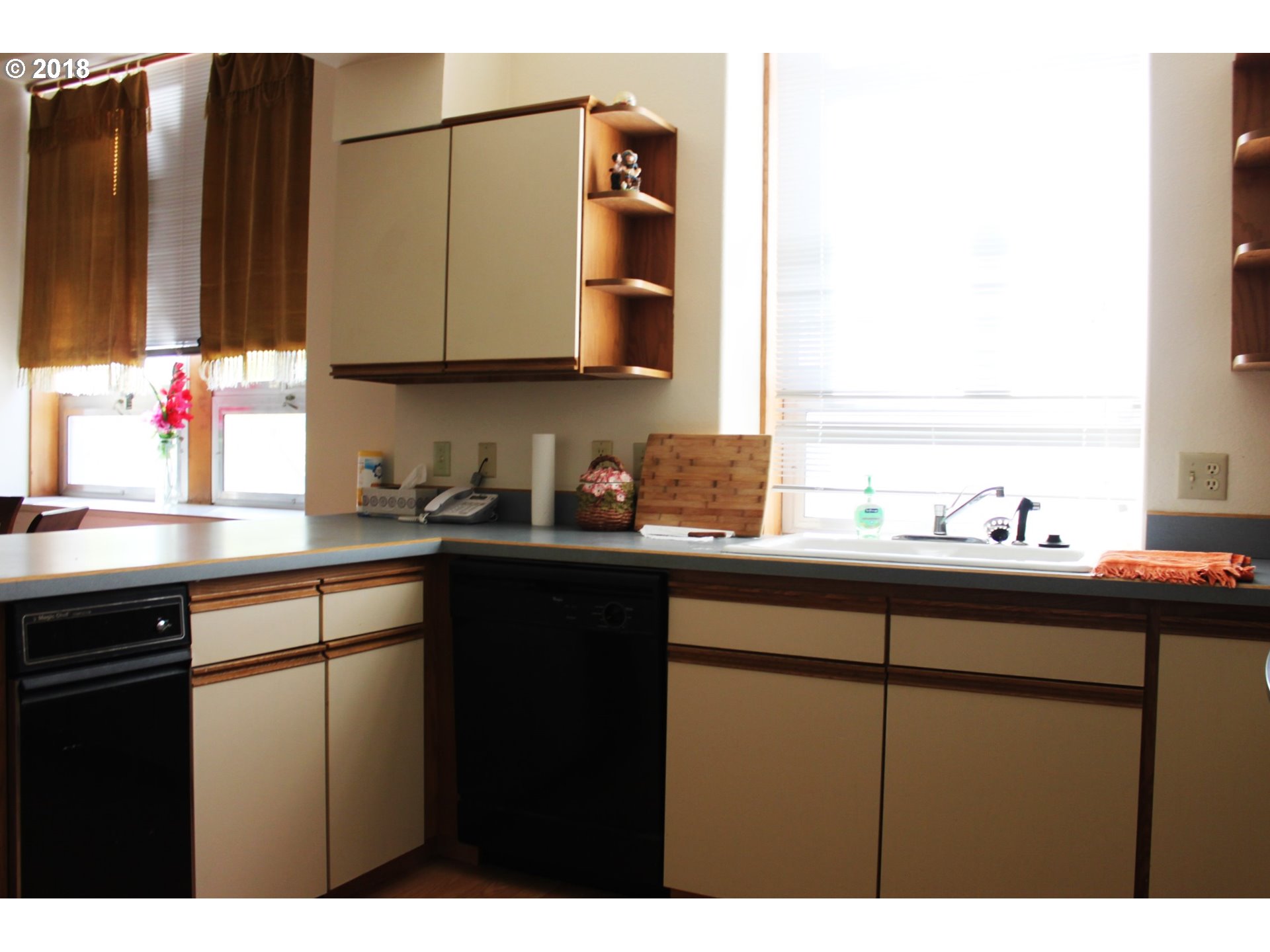 2365 4th Street Baker City, OR 97814 - Photo 7 of 16 a kitchen with a sink cabinets and utility